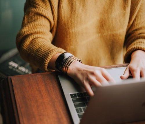typing on laptop