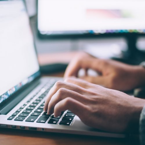writing on a laptop